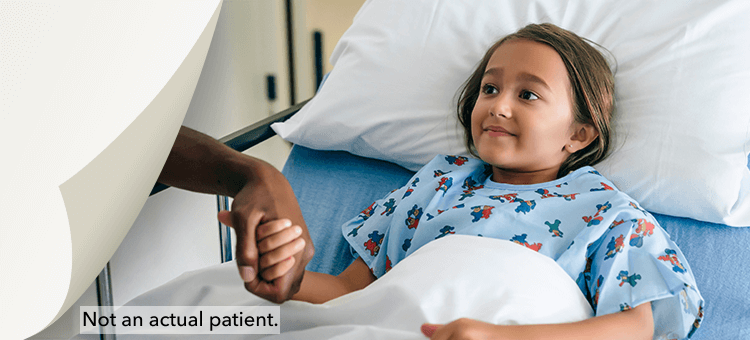 Patient Safety with DEFINITY® Young patient in a hospital bed under observation, illustrating the safety profile of DEFINITY®
