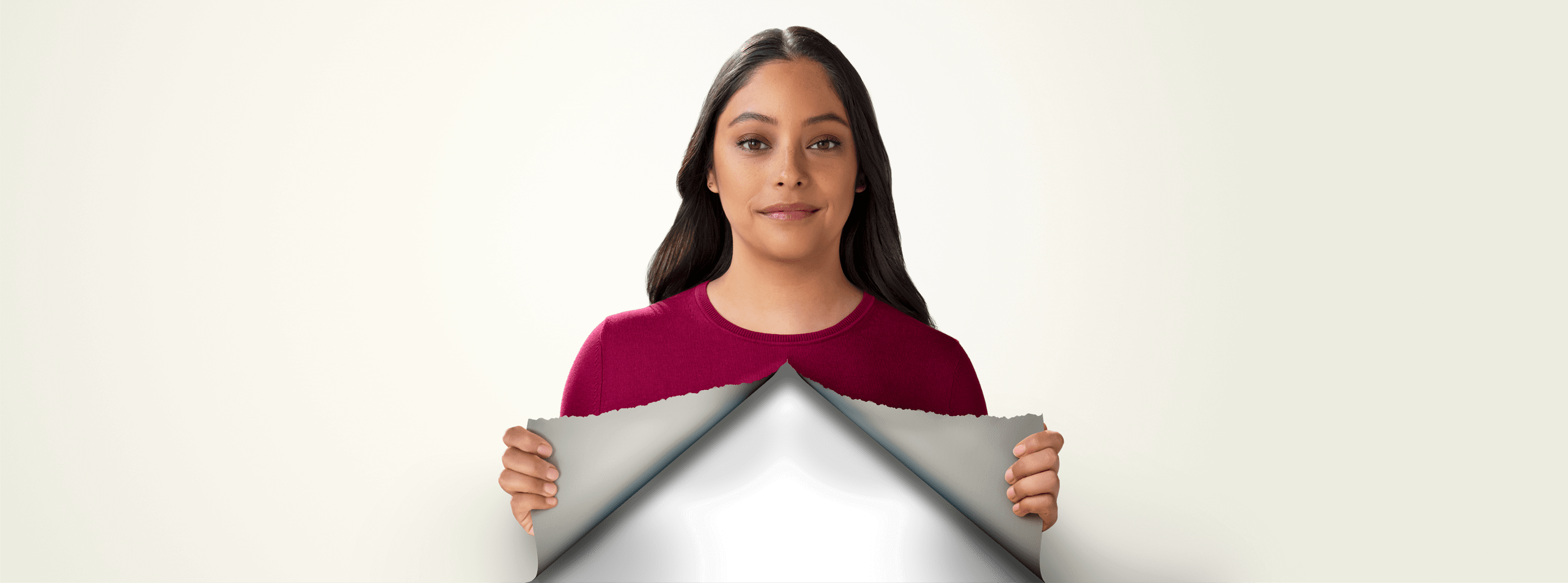 Image of Penny, a young woman and DEFINITY® ambassador, revealing quality medical imaging behind a tear-away concept on her chest