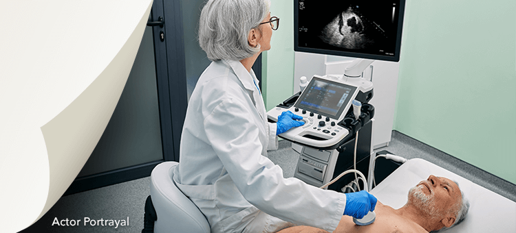 Healthcare professional administering an ultrasound using DEFINITY® on a patient in a clinical setting